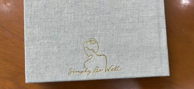 1mm gold foil stamp on oatmeal fabric cover