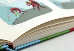 Uncoated off-white paper stock gives a unique, raw feel.