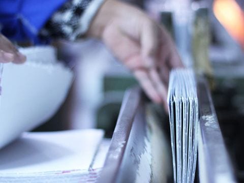 The perfect binding process, commonly referred to as softcover binding, results in a book with a glued binding and a squared-off spine. Smyth Sewing PrintNinja’s perfect binding process, the collated signatures of the book block are sewn together using the...