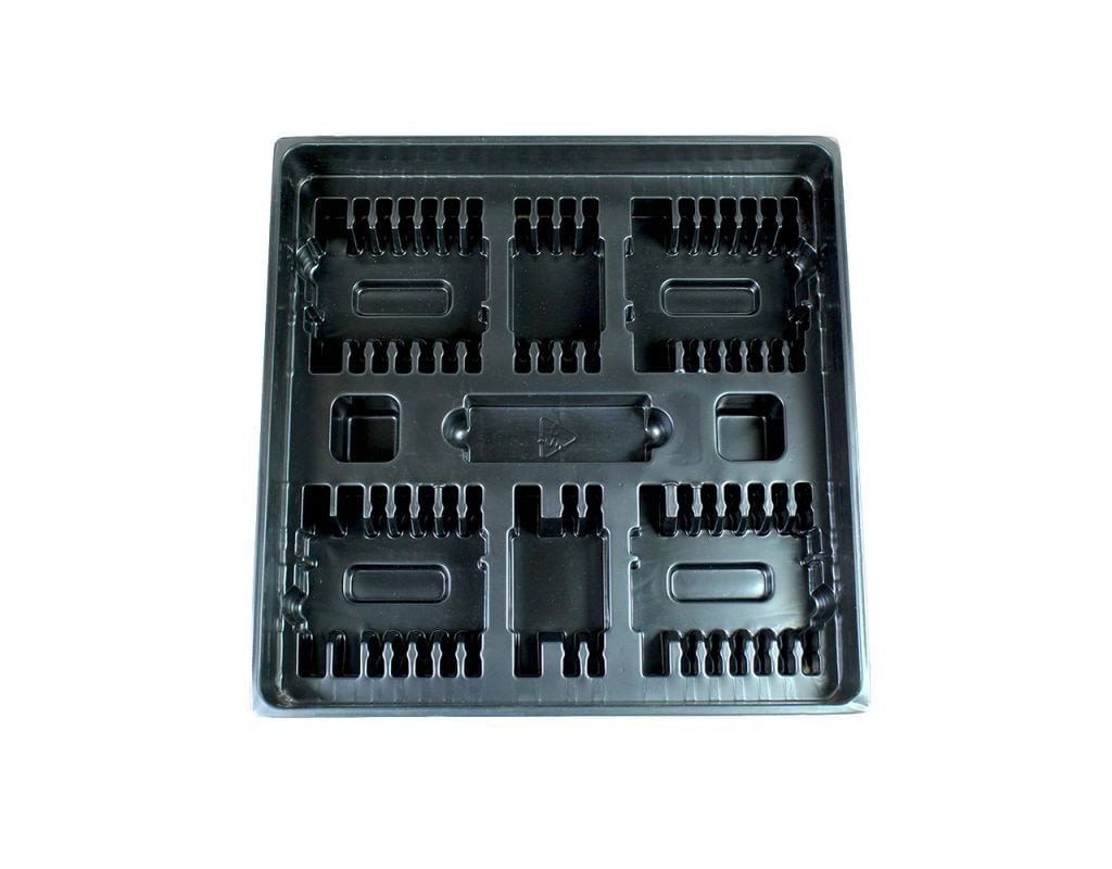 A black vacuum-formed plastic insert for organizing the contents of board games.